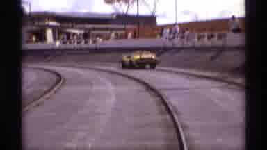 Orlando Florida (1974): Racing Yellow Car On A Speedway Track In Broad Daylight