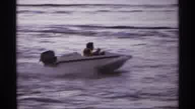 Orlando Florida (1974): Person Riding In Red And White Speedboat On A Clear Day