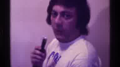 Kentucky (1976): Man Talks Into Small Mic And Address The Camera Then Turns Away
