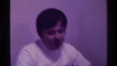 Kentucky (1976): A Young Man Sitting In A Tee Shirt At A Desk With What A