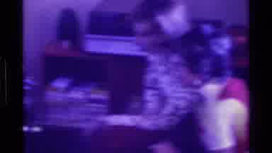 Kentucky (1976): A Lot Of People Watching TV Inside Gathered Around Having Drinks