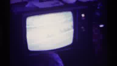 Kentucky (1976): A Person Points To A Old TV Where There's A Horse Race