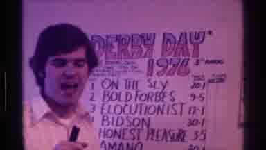 Kentucky (1976): View Of White Derby Day Poster And Man Wearing White Shirt