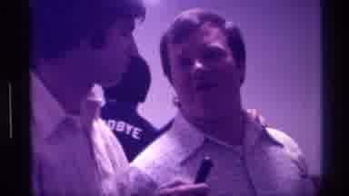 Kentucky (1976): Purple-Hued Footage Of A Man Interviewing Another Man Indoors Two