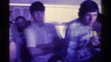 Kentucky (1976): People Are Standing And Sitting Around Watching And Talking