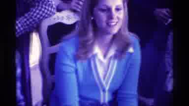 Kentucky (1976): A Group Of People Standing And Sitting Watching TV