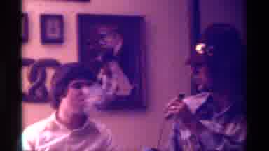 Kentucky (1976): Person Wearing Brown Hat Interviews Man Wearing White Shirt And