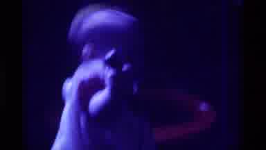 Kentucky (1976): Close Up Of Baby Holding A Toy With A Cord And Putting Object Up