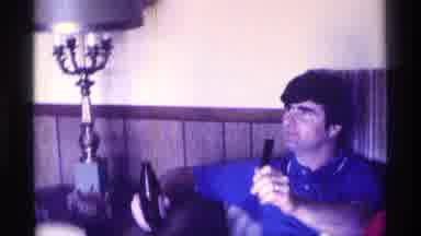 Kentucky (1976): Family Members Have Some Drinks And Laugh In The House