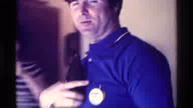 Kentucky (1976): Vintage Party Showing Button On Blue Polo Shirt While Holding