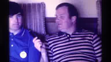Kentucky (1976): A Young Man Getting Interviewed While A Group Of People Watch