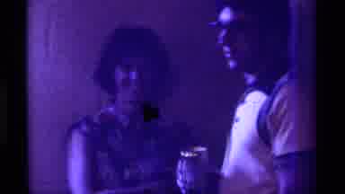 Kentucky (1976): Adults At Party With Beverages In Hand Camera Pans Across Faces