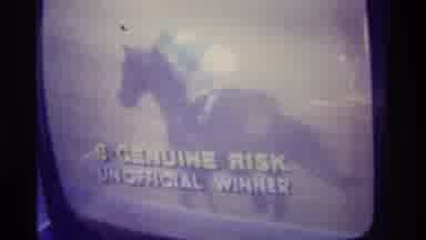 Kentucky (1976): Man Wearing Striped Shirt Talks Into Microelectronic Watching
