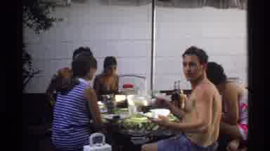 California (1978): Half Naked People Eating Food Outside Together