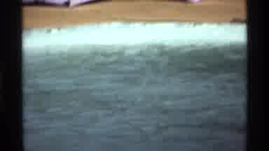 California (1978): Two Young Men Swimming In Pool After Playing With Beach Ball