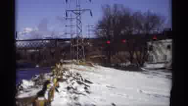 Madison Wisconsin (1966): Shot Of Power Lines And Damn On The River In Winter