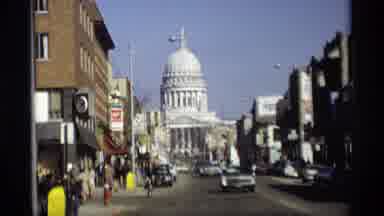 Madison Wisconsin (1966): A Comparison Of A Busy Street Near A Capital To The