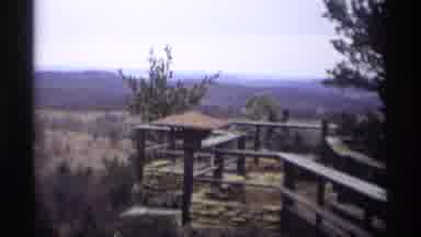 Madison Wisconsin (1966): Walkway And Ledge Overlook And Woman In White Coat Walks