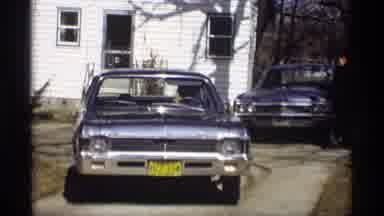 Madison Wisconsin (1966): A Person In A Car Driving Away From A House