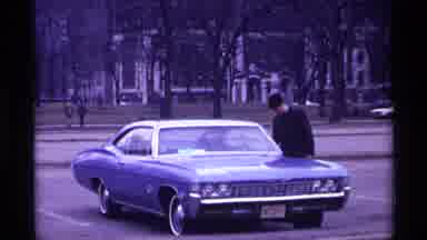 Chicago Illinois (1968): A Man Prepares To Drive His Vintage Automobile From The