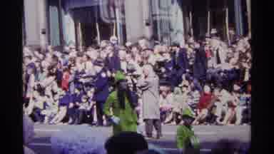 Chicago Illinois (1968): Woman With Dog And Child With Drum Marching Along Saint