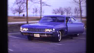 Chicago Illinois (1968): Old Grainy Video Of Man Getting Into His Car To Watch A