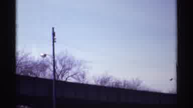 Chicago Illinois (1968): Public Transportation Moving Rapidly Through A Community
