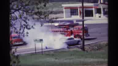 Chicago Illinois (1968): View Of White Mackinac Island Sign And White Car On Fire