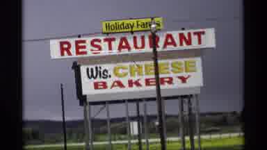 Holland Michigan (1969): View Of White Holiday Farm Sign And Black Steer Statue On