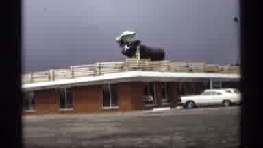 Holland Michigan (1969): Motel With Giant Animal Chef Statute On Its Roof