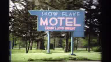 Holland Michigan (1969): View Of Blue Snowflake Hotel Sign On A Clear Day