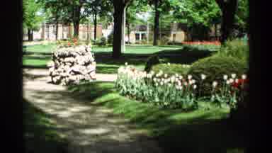 Holland Michigan (1969): A Garden Next To A Big House With Beautiful And Big White