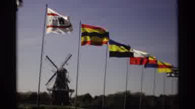 Holland Michigan (1969): Line Of Flags Flying Near Windmill