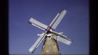Holland Michigan (1969): Slow Turning Windmill With Four Blades Turning On A Clear