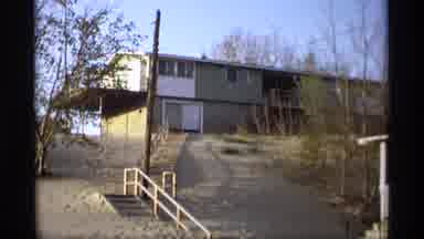 Holland Michigan (1969): View Of Tan House And White Stair Rail On A Clear Day