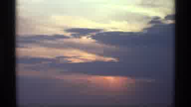 Holland Michigan (1969): Blue Clouds In The Sky Over The Ocean During The Sunset