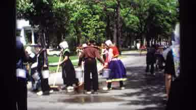Holland Michigan (1969): A Group Of Ladies Cleaning In The Middle If The Street