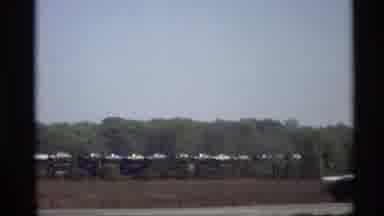 Holland Michigan (1969): May 15 Car Races Past Train Moving In Opposite Direction
