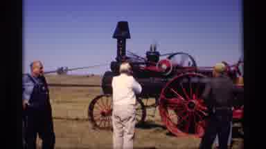 Jordan Minnesota (1969): View Of Red And Black Steam Powered Tractor On A Sunny