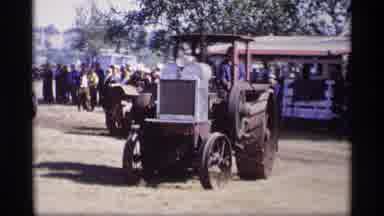 Jordan Minnesota (1969): View Of Black Vintage Tractor On A Bright Sunny Day