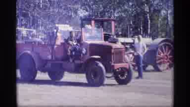 Jordan Minnesota (1969): Old Tractors Driven To A Country Side Event In A Sunny