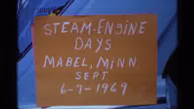 Mabel Minnesota (1969): Steam Engine Days Minnesota Sign Cut To Tractor In Parade