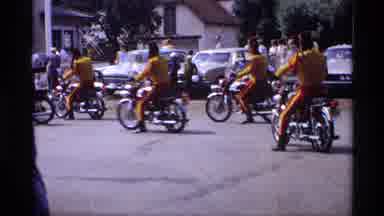 Mabel Minnesota (1969): Shriner Or Mocha Riding Bikes In Parade