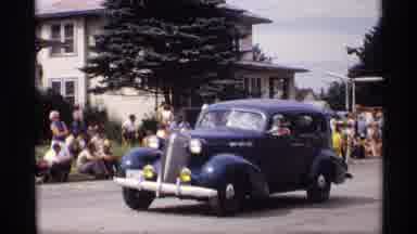 Mabel Minnesota (1969): Vintage Cars Parade Float Drive Slowly Down Crowded Street