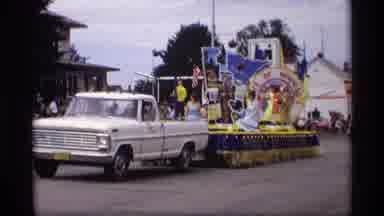 Mabel Minnesota (1969): White Ford Pickup Truck Pulls Minnesota Parade Float With