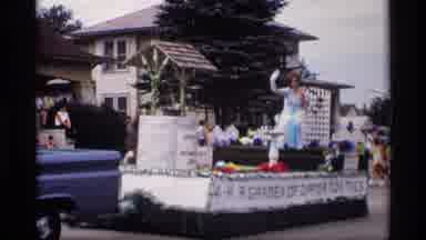 Mabel Minnesota (1969): Several Floats In A Parade And The People On The Float