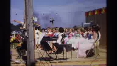 Mabel Minnesota (1969): Man Wearing Glasses And A Tie Making An Animated Speech At