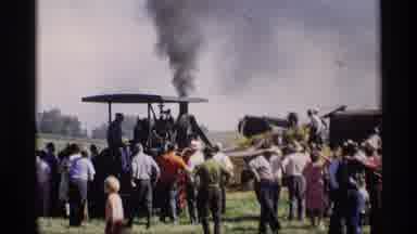 Mabel Minnesota (1969): Truck With Smoke In Front Of Crowd In A Retro Time