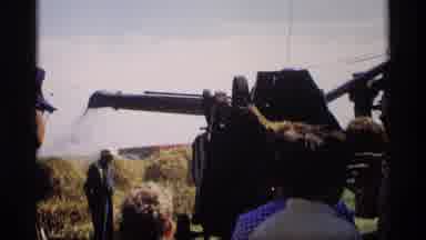 Mabel Minnesota (1969): Machine Shooting Hay Into Bales Draws A Crowd Of Hawkers