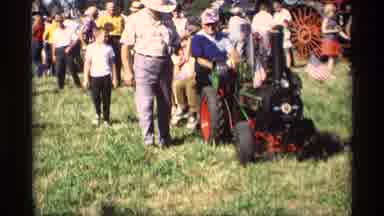 Mabel Minnesota (1969): People Enjoying An Outdoor Fair And Taking A Ride With A